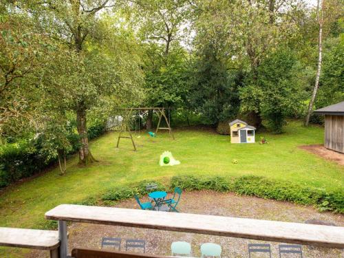 an aerial view of a yard with a playground at Grand Villa with Bubble Bath in Ferrières