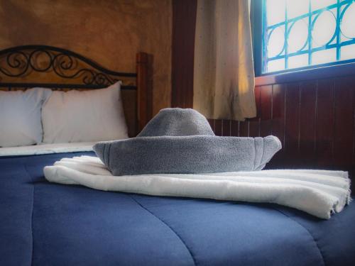 Ένα ή περισσότερα κρεβάτια σε δωμάτιο στο Hotel La Casona Real
