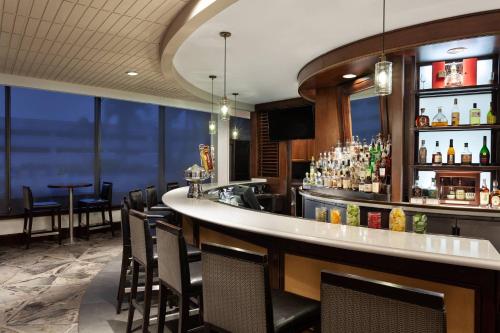 a bar in a hotel with a view at Tampa Airport Marriott in Tampa