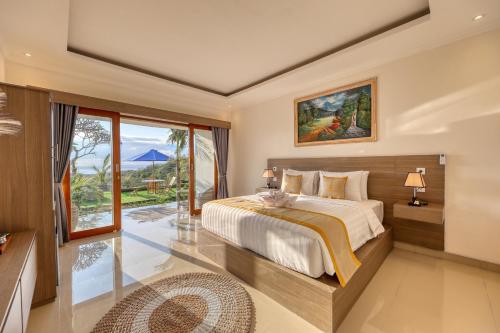 Postel nebo postele na pokoji v ubytování Kelingking Parama Resort
