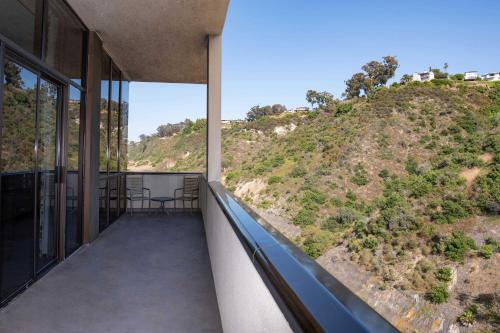 a balcony with a view of a hill at Sheraton Mission Valley San Diego Hotel in San Diego