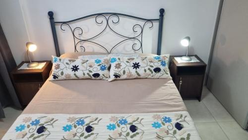 a bedroom with a bed with two night stands at Nice San Telmo in Buenos Aires