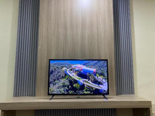 Peaceful Hotelにあるテレビまたはエンターテインメントセンター