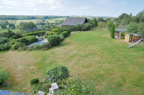 an aerial view of a large yard with a house at Rotonde in Somme-Leuze