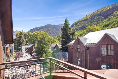 a balcony with a view of a mountain at 330 W Pacific B townhouse in Telluride