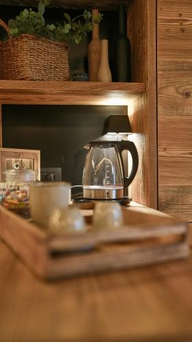 a tea kettle sitting on top of a counter at Alpine Suite - Cervinia in Breuil-Cervinia