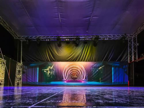 an empty stage with purple and purple lights at Sundia By Liberty Oludeniz in Oludeniz