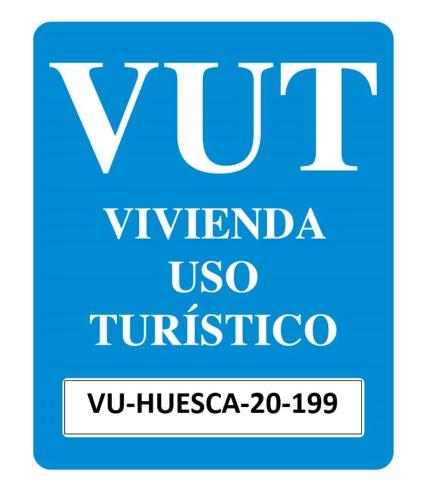 a blue rectangle with the words vu universidad uso turico at Apartamento Capelot in Jaca
