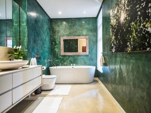 Ένα μπάνιο στο Luxury Villa Aloe Ridge - Eden Rock Luxury Estate, Pennington