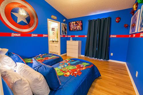 a room with two beds and a captain america bedroom at Thematic House with Private PoolSpaGame Room in Loughman