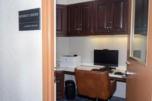an office with a desk with a computer on it at Hampton Inn & Suites Riverton in Riverton