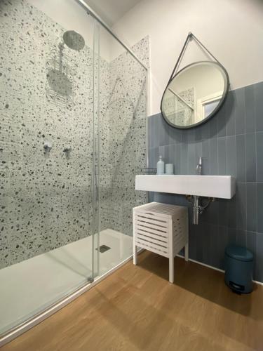 a bathroom with a sink and a shower at Casa Salvia in Alcamo