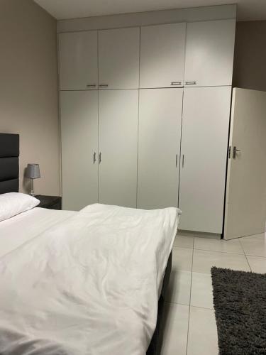 Katil atau katil-katil dalam bilik di Stern self catering apartments