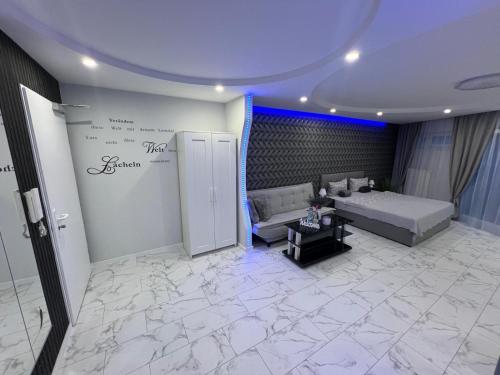 a living room with a bed and a couch at Viktor Deluxe in Gotha