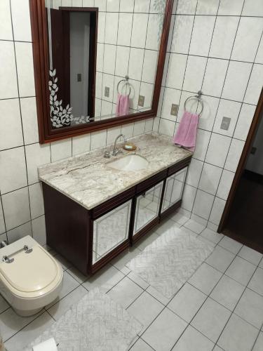 Bilik mandi di Quarto compartilhado 4 pessoas