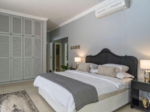 Ένα ή περισσότερα κρεβάτια σε δωμάτιο στο Eden Rock Luxury Villas, Pennington