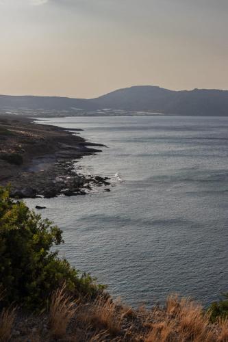 a view of a large body of water at Beachfront Villa Atalandia with Heated Pool, Gym, BBQ & Office in Goúdhouros