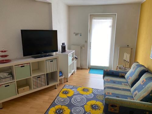 TV a/nebo společenská místnost v ubytování Ferienwohnung Meschi