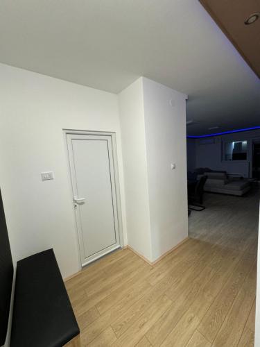 TV a/nebo společenská místnost v ubytování Brasic Apartman