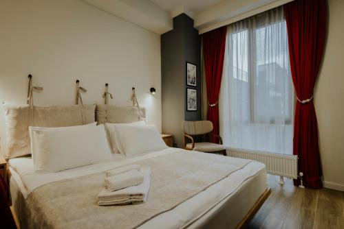 Postel nebo postele na pokoji v ubytování Luxury Inn Grand Residences