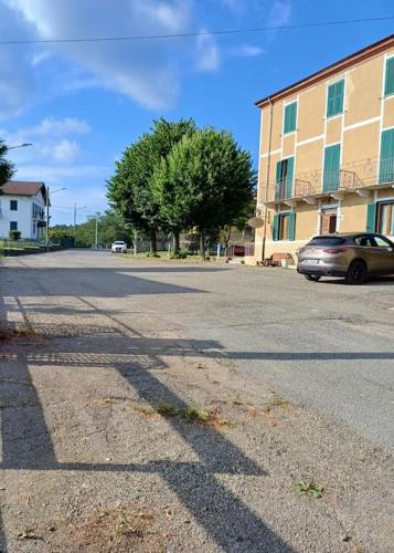 a car parked on a street next to a building at Casa Mariuccia in Ponzone