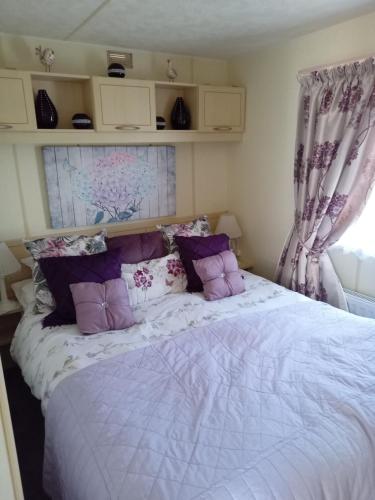 Ένα ή περισσότερα κρεβάτια σε δωμάτιο στο Sunvalley caravan park