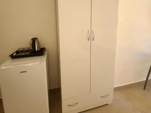 Kuchyň nebo kuchyňský kout v ubytování Arli Eris Rent rooms