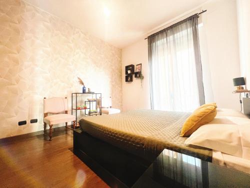 Postel nebo postele na pokoji v ubytování The Apartment Verona - in exclusive collaboration with restaurant