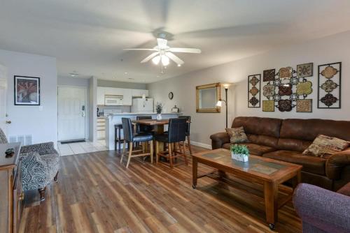 a living room with a couch and a table at Daydreamer - Beautiful Views & Location in Branson