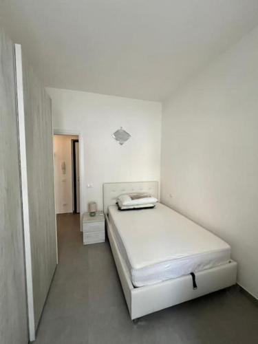 Ένα ή περισσότερα κρεβάτια σε δωμάτιο στο Risorgimento Apartment Verona