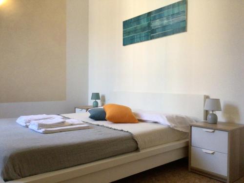 Posteľ alebo postele v izbe v ubytovaní A due passi da Giulietta-Casa Montecchi