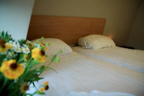 ホテル 55 シティ センターにあるベッド