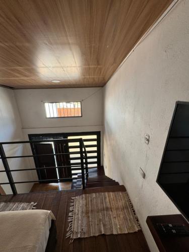 Postel nebo postele na pokoji v ubytování Guaduas apartaestudio Angel de la Villa