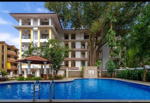 Bazén v ubytování Cozy 2BHK Pool Apartment in candolim nebo v jeho okolí