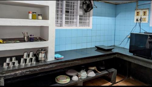 Kuchyň nebo kuchyňský kout v ubytování Humble Family Abode