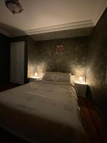 Postel nebo postele na pokoji v ubytování Nice appartement au centre de IFRANE
