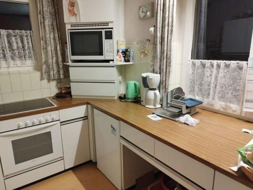Η κουζίνα ή μικρή κουζίνα στο Geräumige 100qm - Wohnung, Bregenz am Bodensee