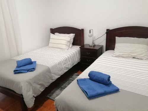 Postel nebo postele na pokoji v ubytování Ribeirinho Apartment - Machico Beach