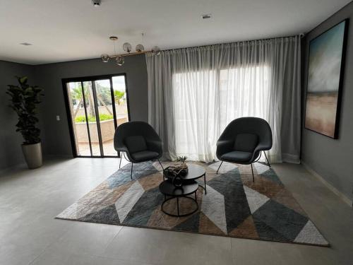 Χώρος καθιστικού στο One House Portao