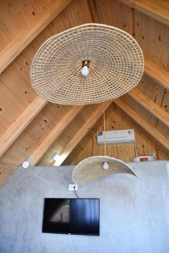 TV a/nebo společenská místnost v ubytování Cabaña Boutique Táva Home