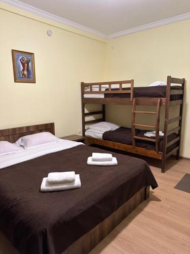 Llit o llits en una habitació de Guest House Mukha