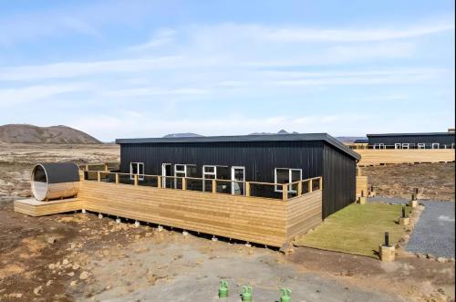 a modular home being constructed in the desert at Cozy Cabin with Hot Tub & Sauna - Ultimate Retreat in Veiðilundur