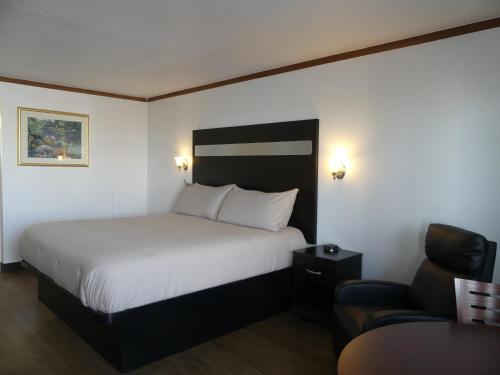 Postel nebo postele na pokoji v ubytování Big Chief Motel