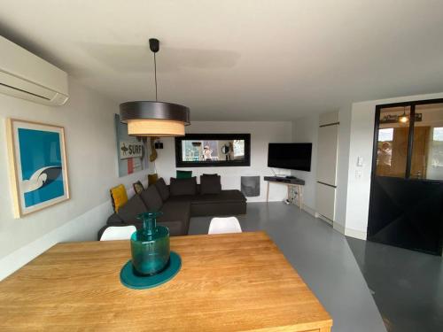 T3 Confort avec Clim et Wifi, Terrasse, 300m Commerces, Plage à Proximité, Parking Privé