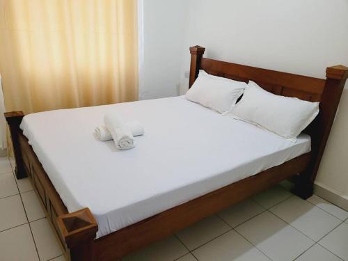 Ένα ή περισσότερα κρεβάτια σε δωμάτιο στο 2 Bedroom AJ101 Mombasa CBD, Buxton Point Lifestyle