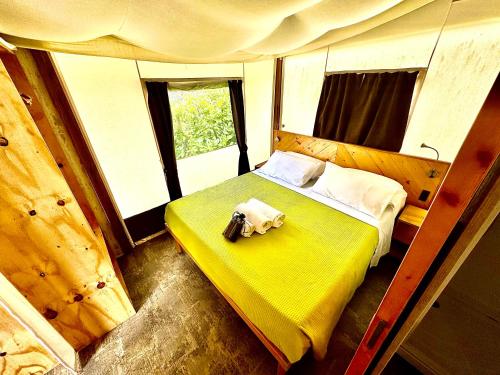 Postel nebo postele na pokoji v ubytování Monja Camping Village