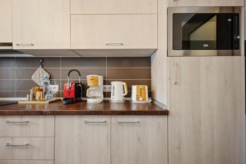 Dapur atau dapur kecil di Wooden Touch Studio
