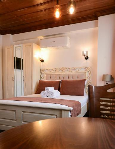Postel nebo postele na pokoji v ubytování Galata Dream Hotel