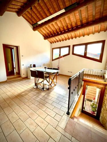 a large room with a ping pong table in it at Al Portico in Pove del Grappa