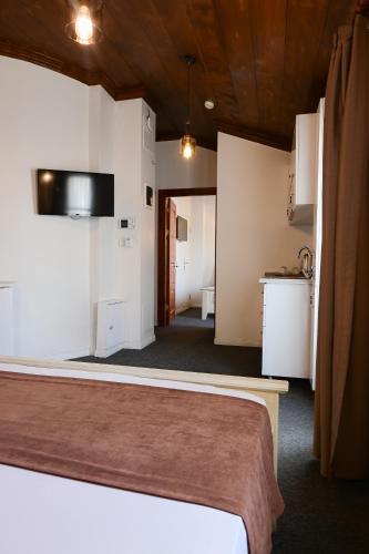 TV a/nebo společenská místnost v ubytování Galata Dream Hotel